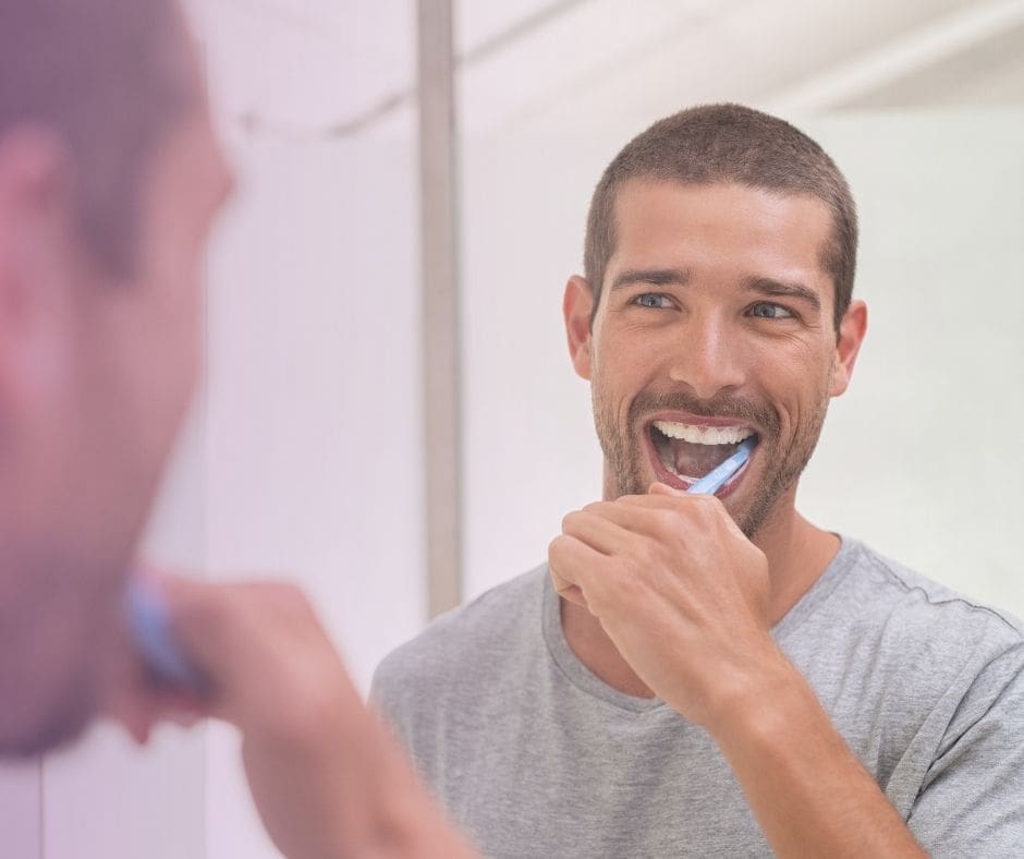 oral hygiene | man brushing his teeth