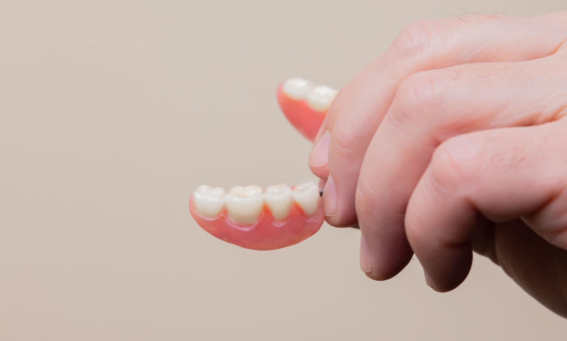 holding dentures