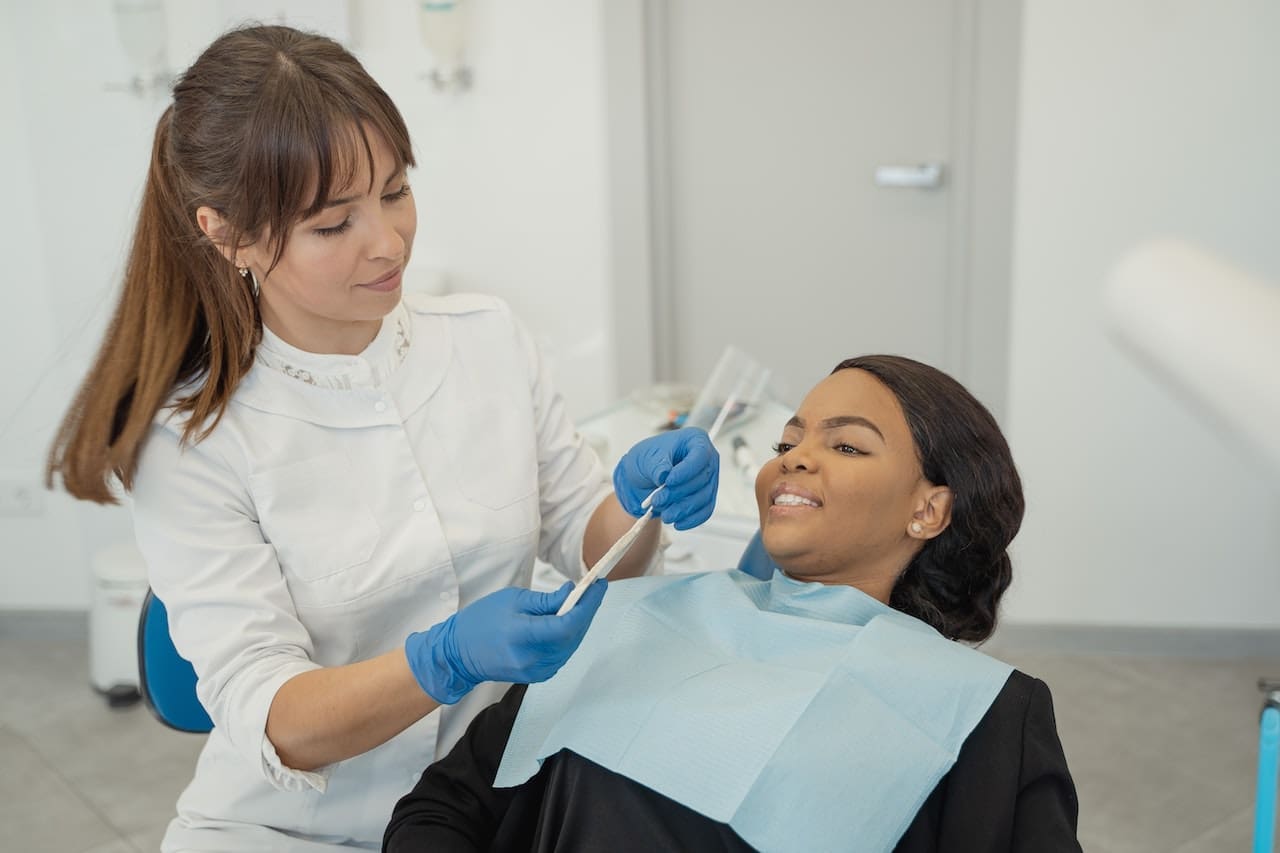 woman undergoing dental implants procedure